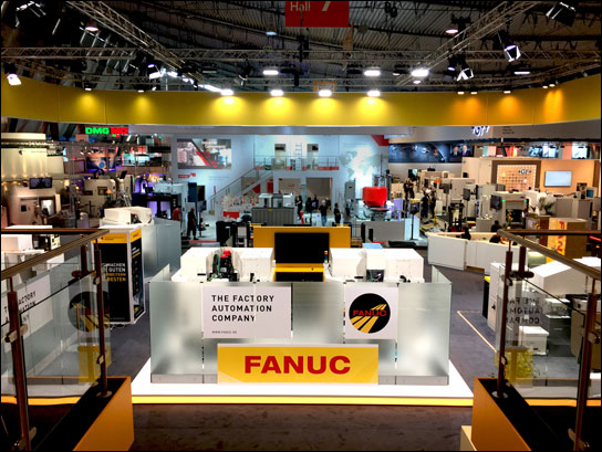 Mit dem Zusammenspiel von Warm- und Kaltlicht sorgte  GEMCO für klare Strukturen auf dem FANUC-Stand.